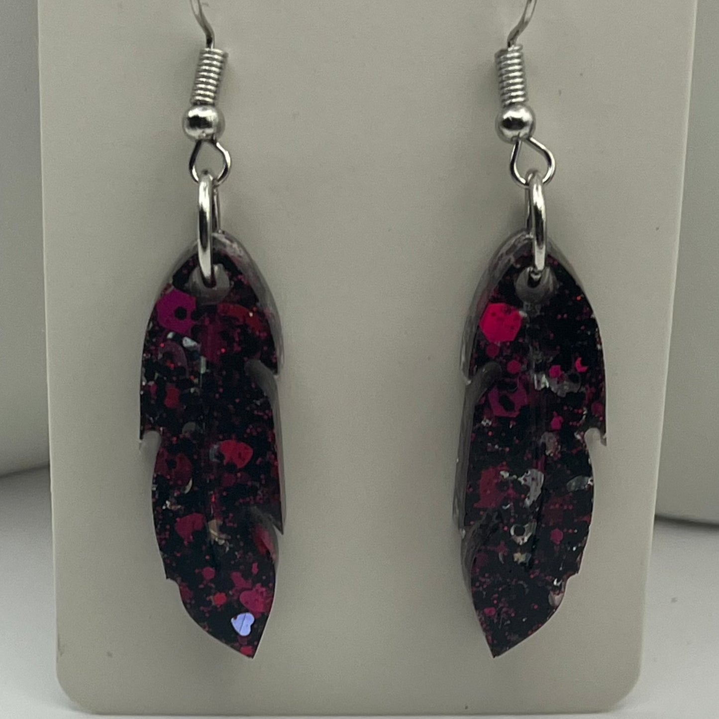 Medium Feathers Black with Pink and Silver Hearts.