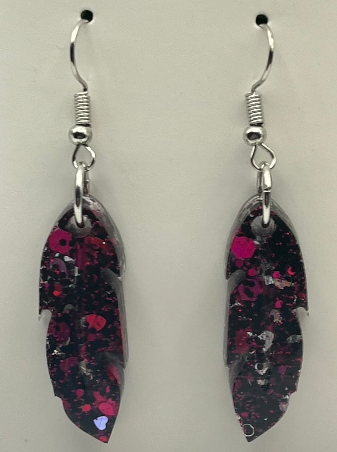 Medium Feathers Black with Pink and Silver Hearts.