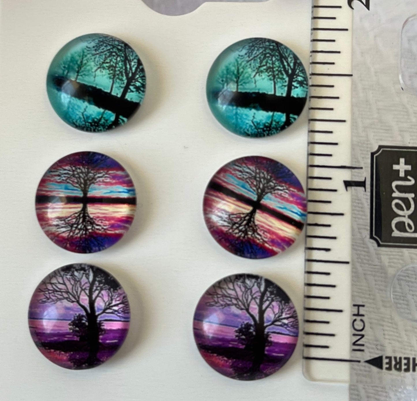 Three pair pack, teal, sunset, and purple with trees